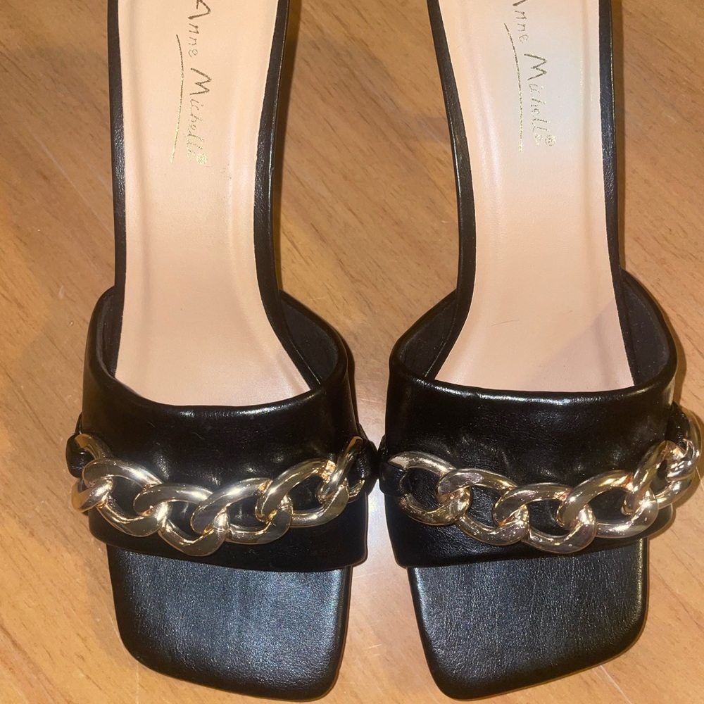 Black kitten heel sandals with gold chain detail